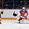 ST. CATHARINES, CANADA - JANUARY 15: Russia's Valeria Tarakanova #1 makes a glove save against Sweden's Wilma Johansson #14 during bronze medal game action at the 2016 IIHF Ice Hockey U18 Women's World Championship. (Photo by Jana Chytilova/HHOF-IIHF Images)

